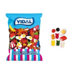 Disfruta de las golosinas clásicas de siempre con este estupendo surtido de golosinas mini de brillo. Este surtido está compuesto por ositos, moritas, huevos fritos y ladrillos de regaliz, todas ellas en su versión mini. No solo sus formas, sino sus increíbles sabores: fresa, mora, limón, naranja, manzana y piña harán que este mix se convierta en uno de tus favoritos. ¡Te encantará!